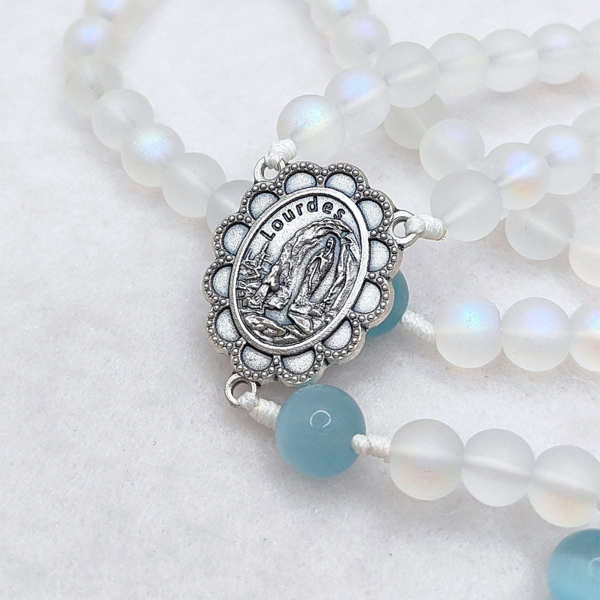 Our Lady of Lourdes White Glass & Blue Cat Eye Rosary