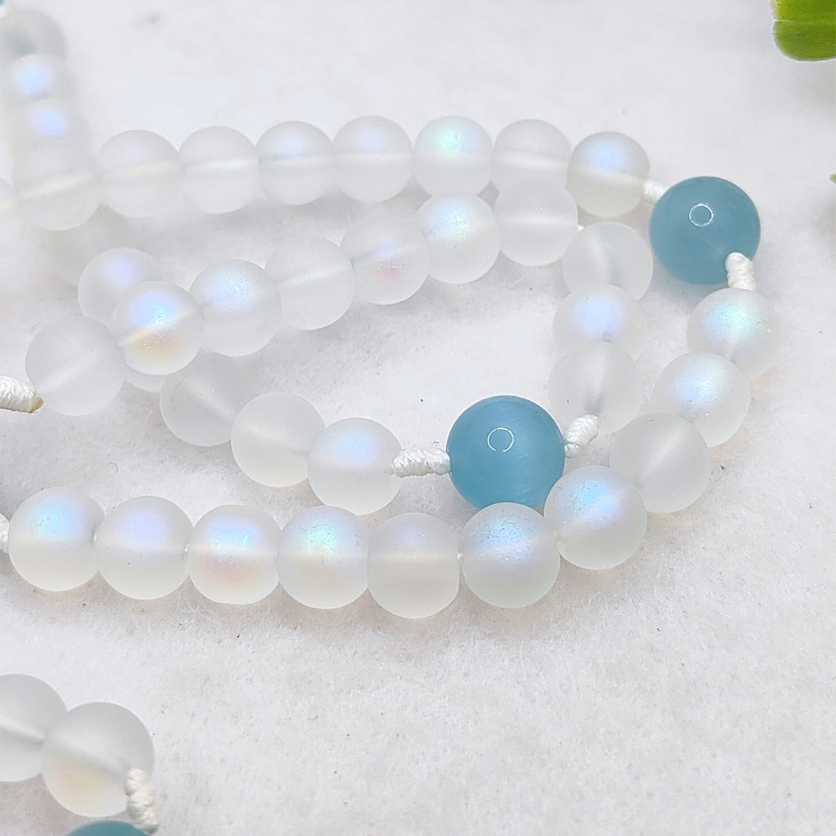 Our Lady of Lourdes White Glass & Blue Cat Eye Rosary